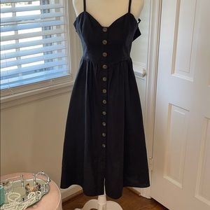 Reformation button front midi dress.